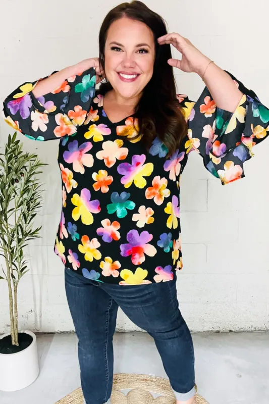 Be Bold Black Floral Hi-Lo Ruffle Sleeve Woven Top sold by Charming Charlie