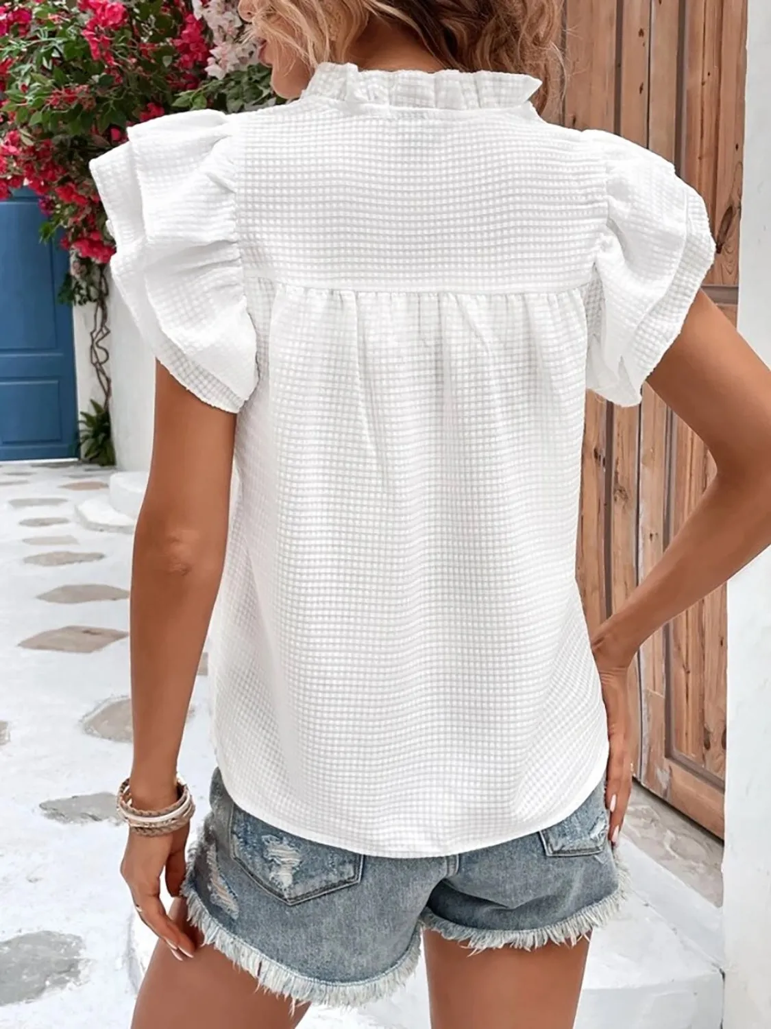 Ruffled Notched Cap Sleeve Blouse sold by Charming Charlie product image thumbnail 4