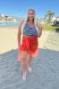 Wrapped In Summer Versatile Swim Cover in Orange sold by Charming Charlie