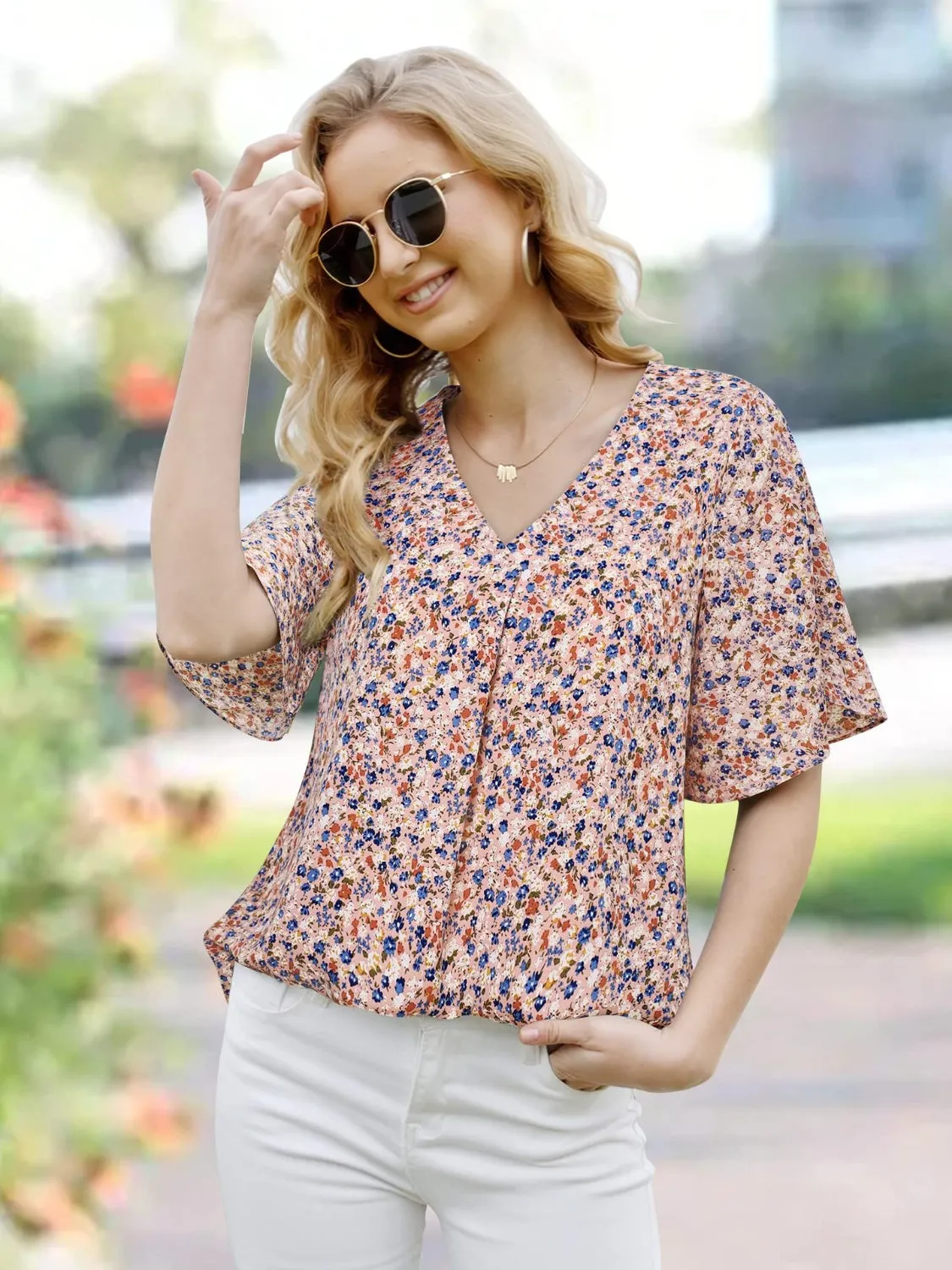 Printed V-Neck Slit Half Sleeve Blouse sold by Charming Charlie product image thumbnail 4
