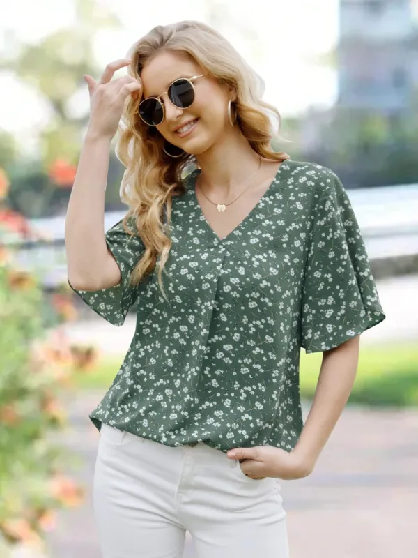 Printed V-Neck Slit Half Sleeve Blouse sold by Charming Charlie