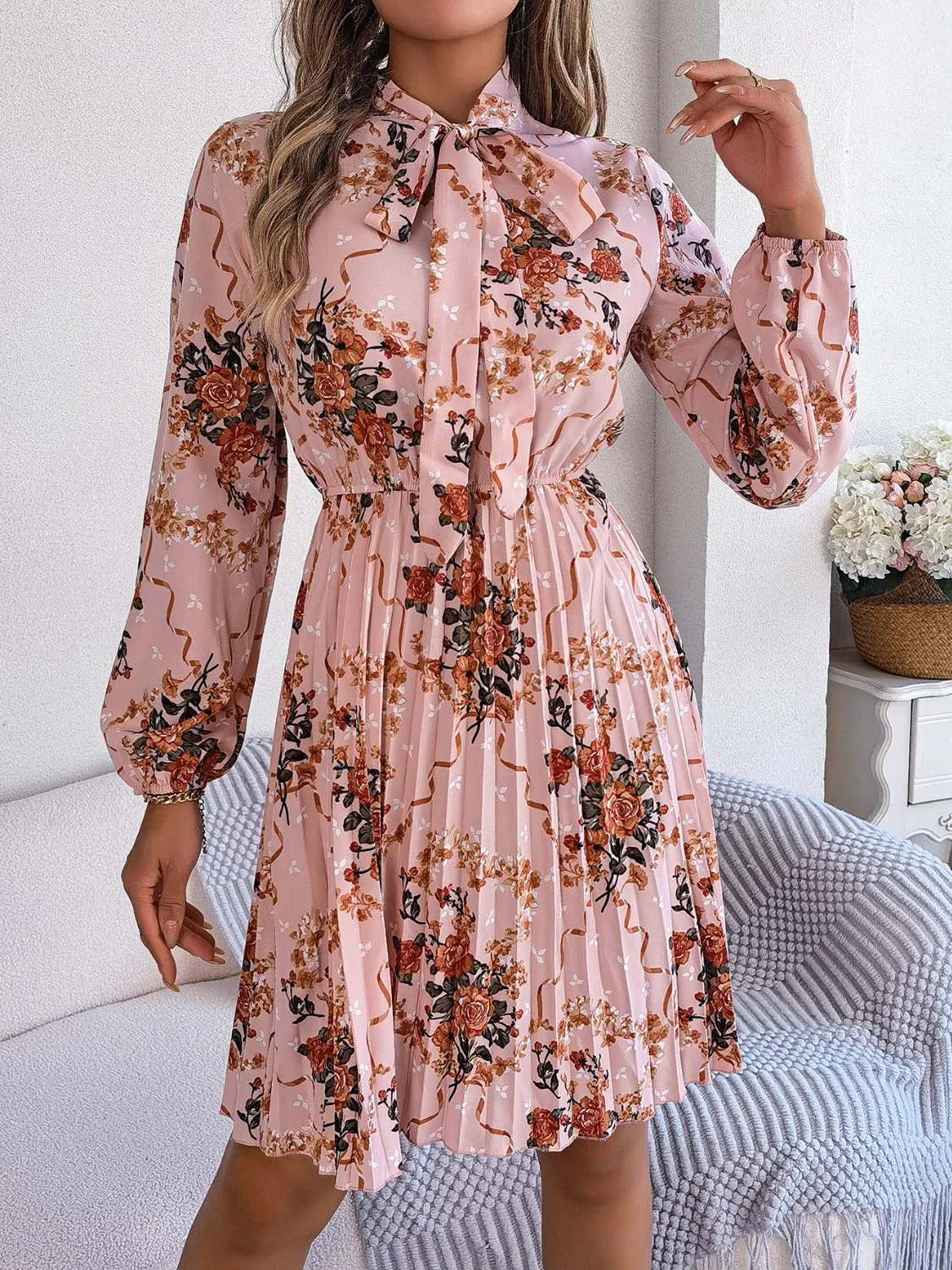 Pleated Printed Tie Neck Long Sleeve Dress sold by Charming Charlie