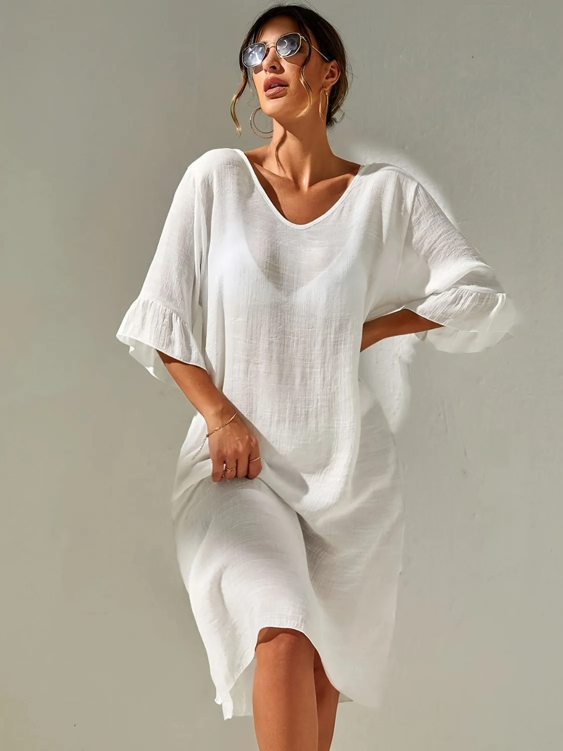 Slit V-Neck Flounce Sleeve Cover-Up sold by Charming Charlie