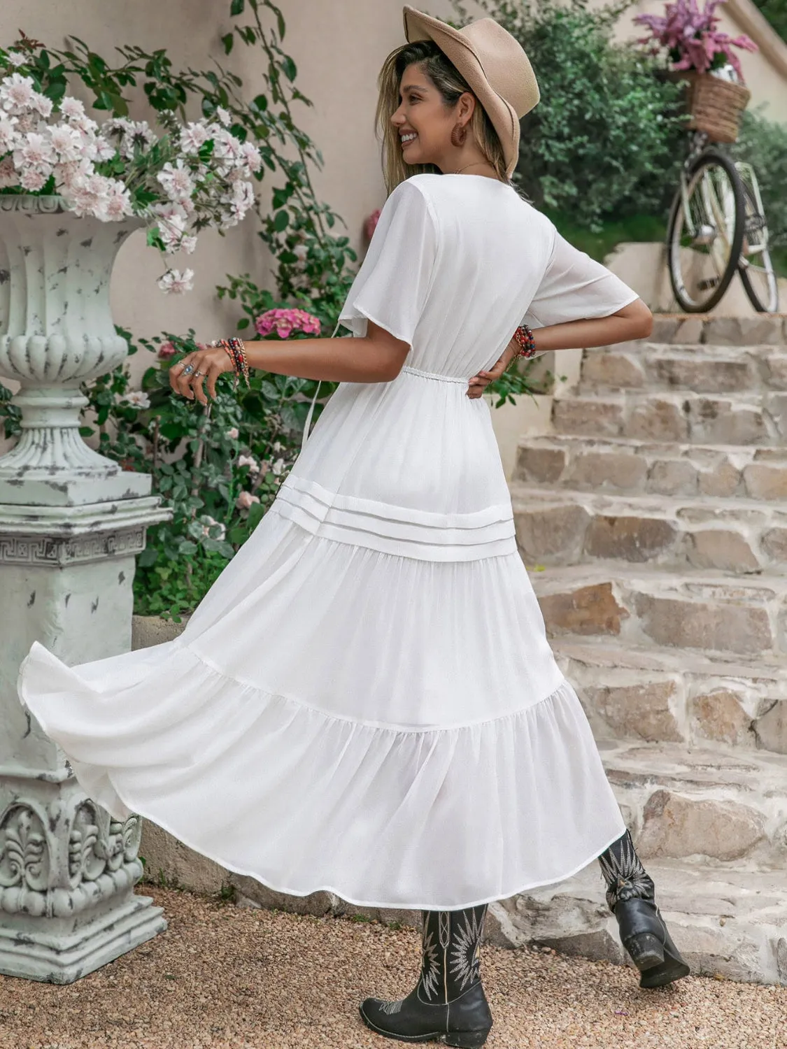 Tie Neck Short Sleeve Ruffle Hem Dress sold by Charming Charlie product image thumbnail 2