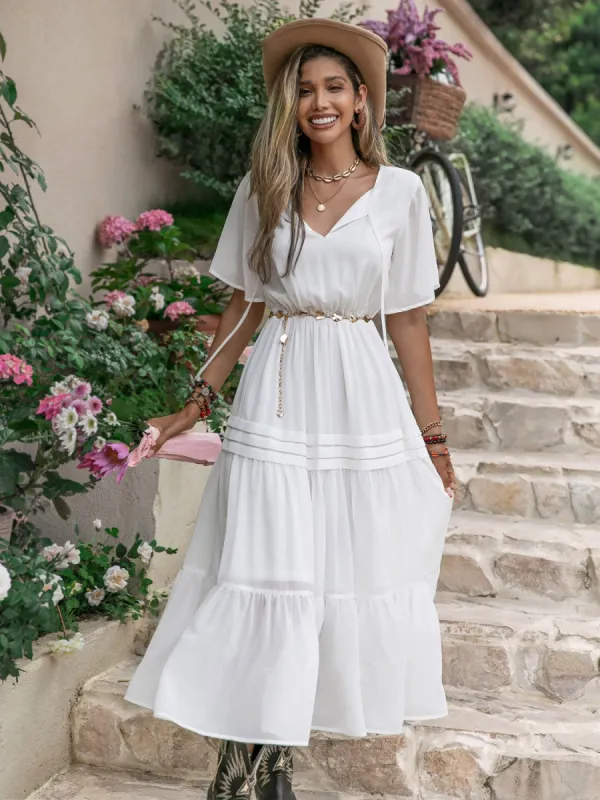 Tie Neck Short Sleeve Ruffle Hem Dress sold by Charming Charlie