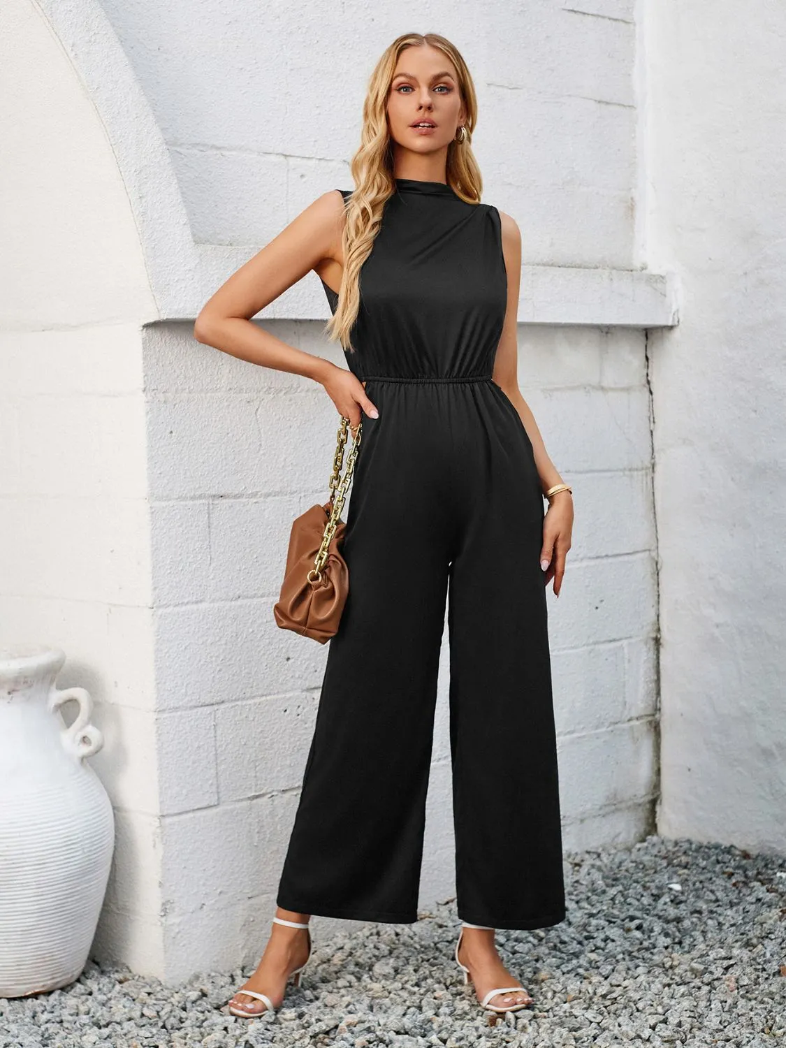 Cutout Tied Wide Leg Sleeveless Jumpsuit sold by Charming Charlie