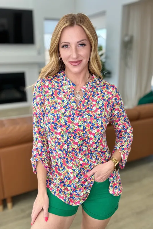 Lizzy Top in Coral Ditsy Floral sold by Charming Charlie