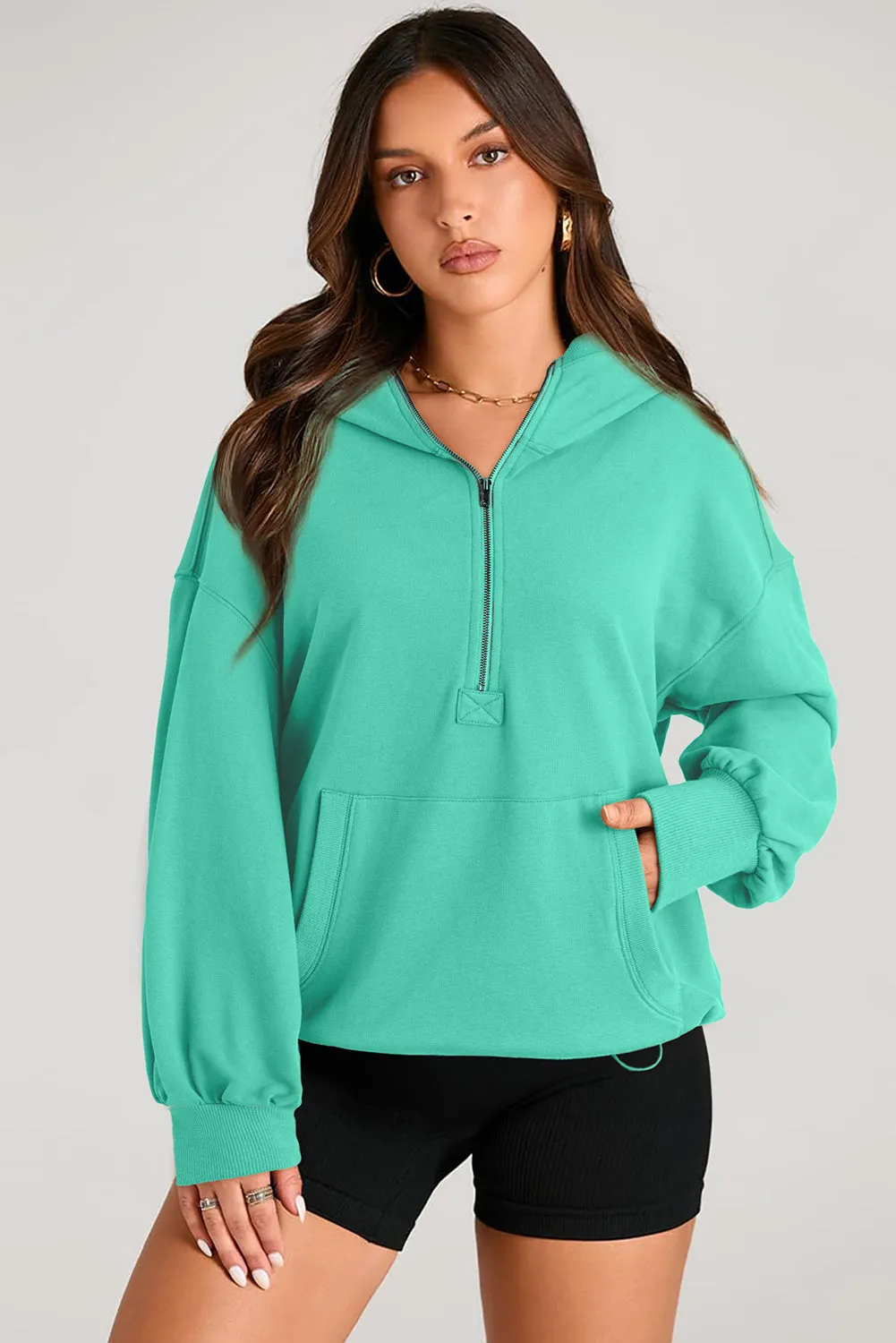 Pocketed Half Zip Long Sleeve Hoodie sold by Charming Charlie