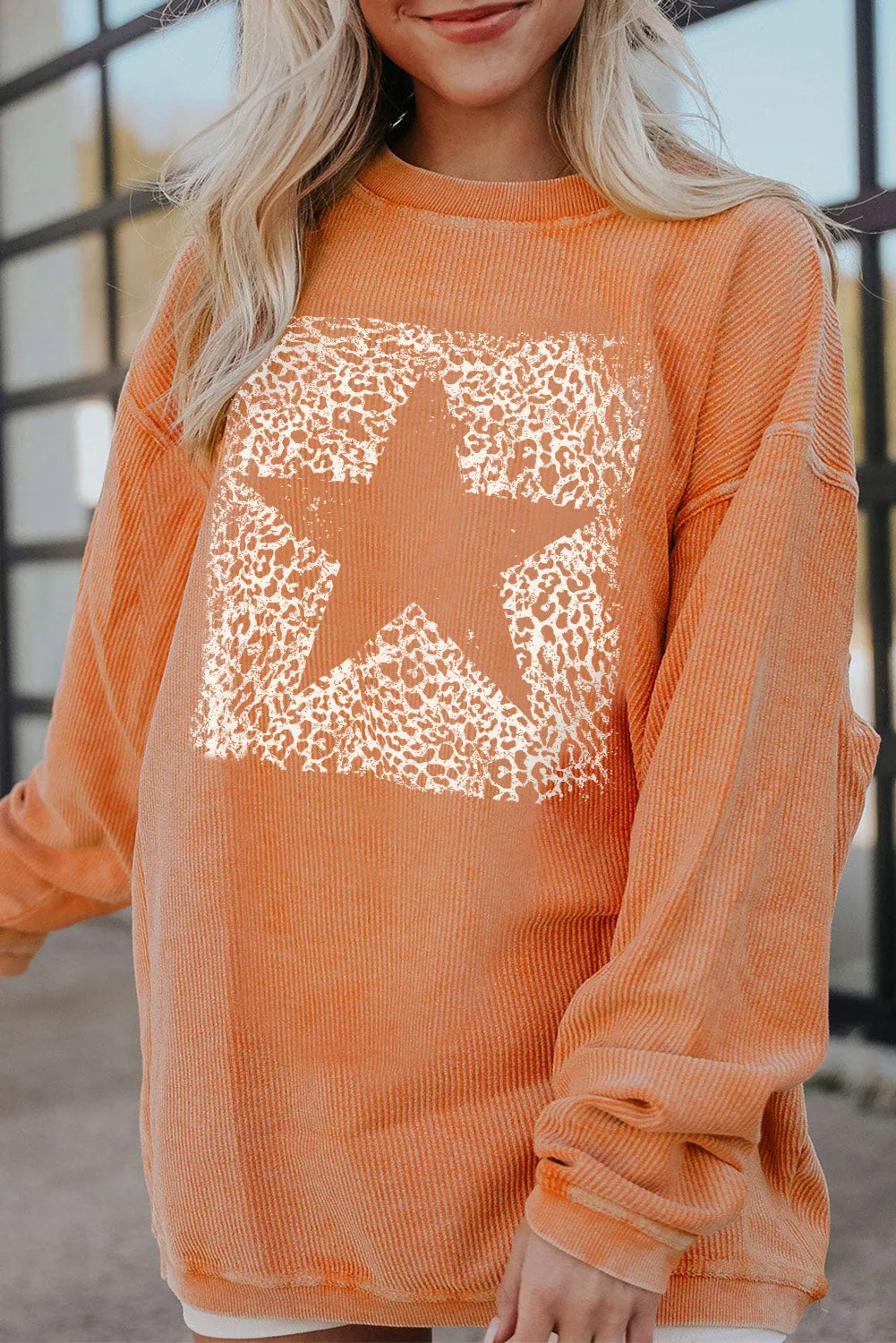 Star Round Neck Long Sleeve Oversize Sweatshirt sold by Charming Charlie