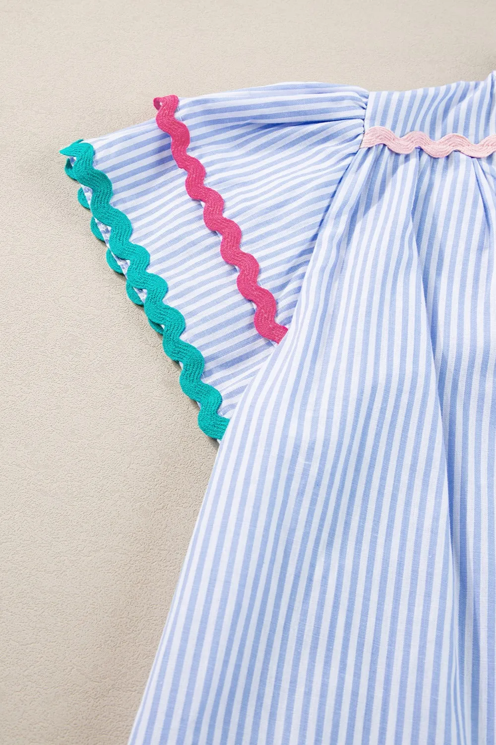 Striped Notched Short Sleeve Blouse sold by Charming Charlie product image thumbnail 4