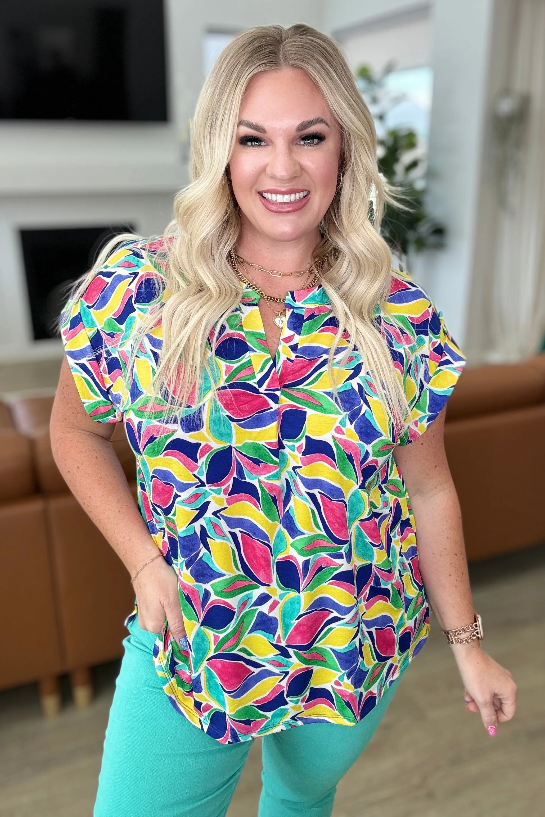 Lizzy Cap Sleeve in Royal and Magenta Mod Floral sold by Charming Charlie