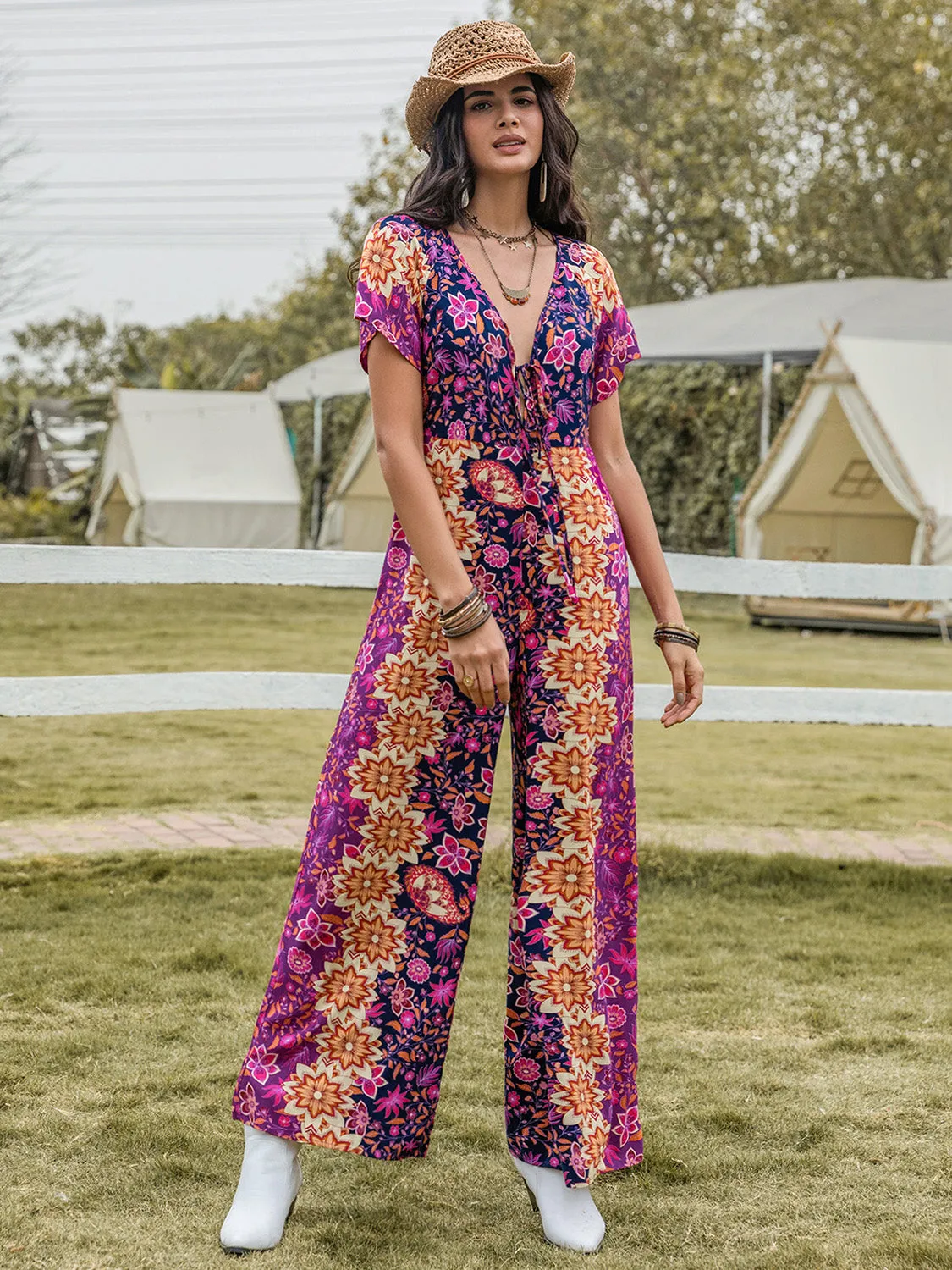 Tied V-Neck Short Sleeve Jumpsuit sold by Charming Charlie product image thumbnail 3