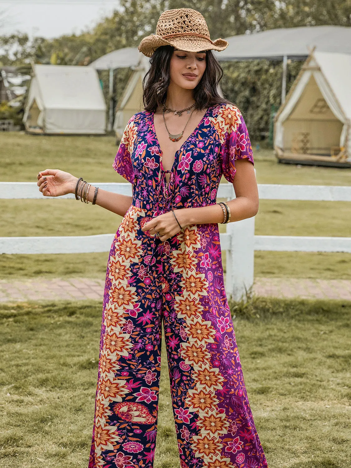 Tied V-Neck Short Sleeve Jumpsuit sold by Charming Charlie product image thumbnail 4