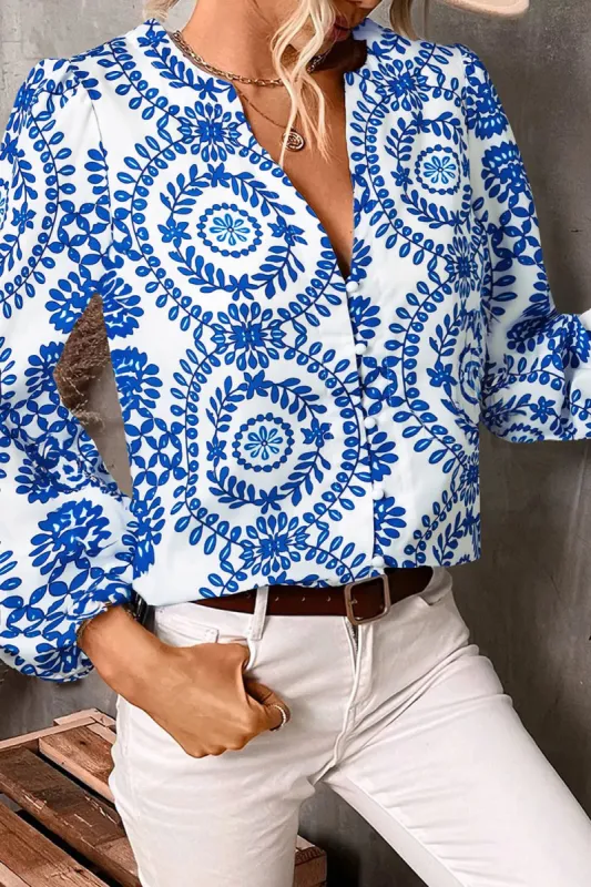 Printed Notched Long Sleeve Blouse sold by Charming Charlie