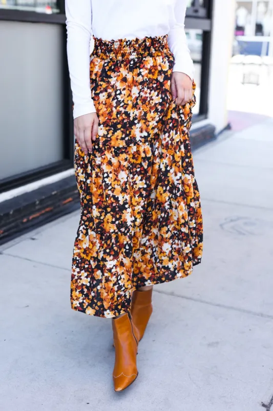 Casual Living Black Floral Tiered Smocked Waist Midi Skirt sold by Charming Charlie