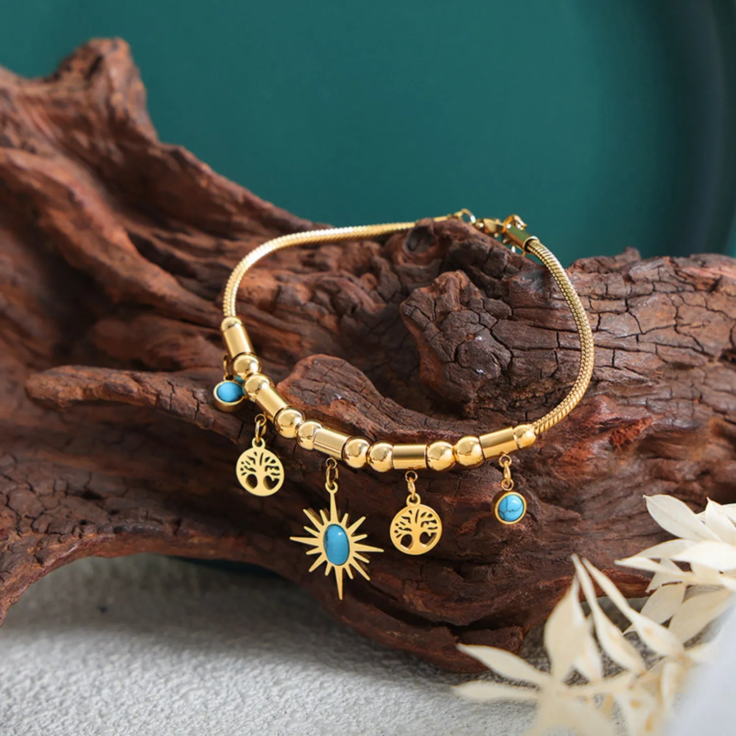 Gold-Plated Titanium Steel Charm Bracelet sold by Charming Charlie