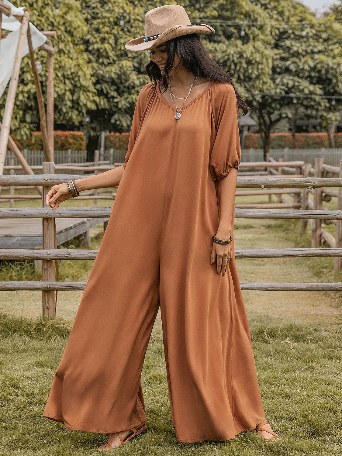 Scoop Neck Half Sleeve Wide Leg Jumpsuit sold by Charming Charlie