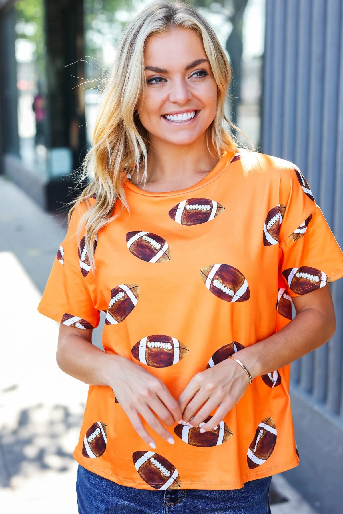 Game Day Orange Football Print Knit Top sold by Charming Charlie product image thumbnail 5