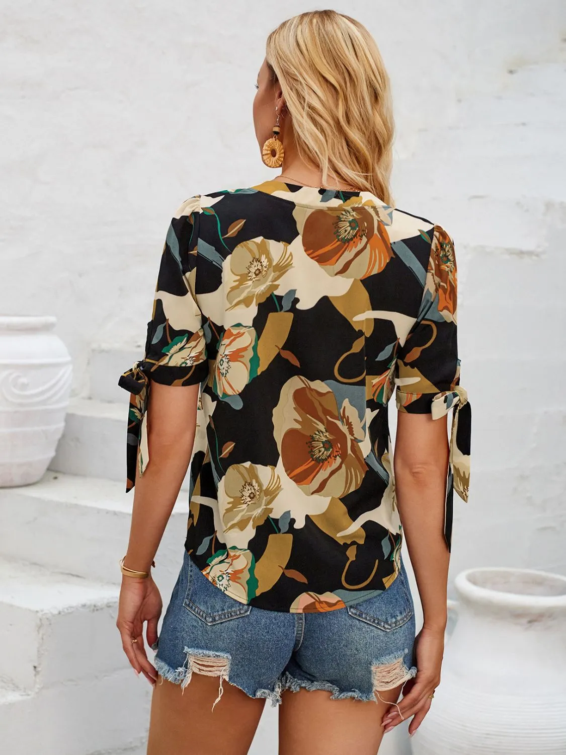 Tied Printed Notched Short Sleeve Blouse sold by Charming Charlie product image thumbnail 2