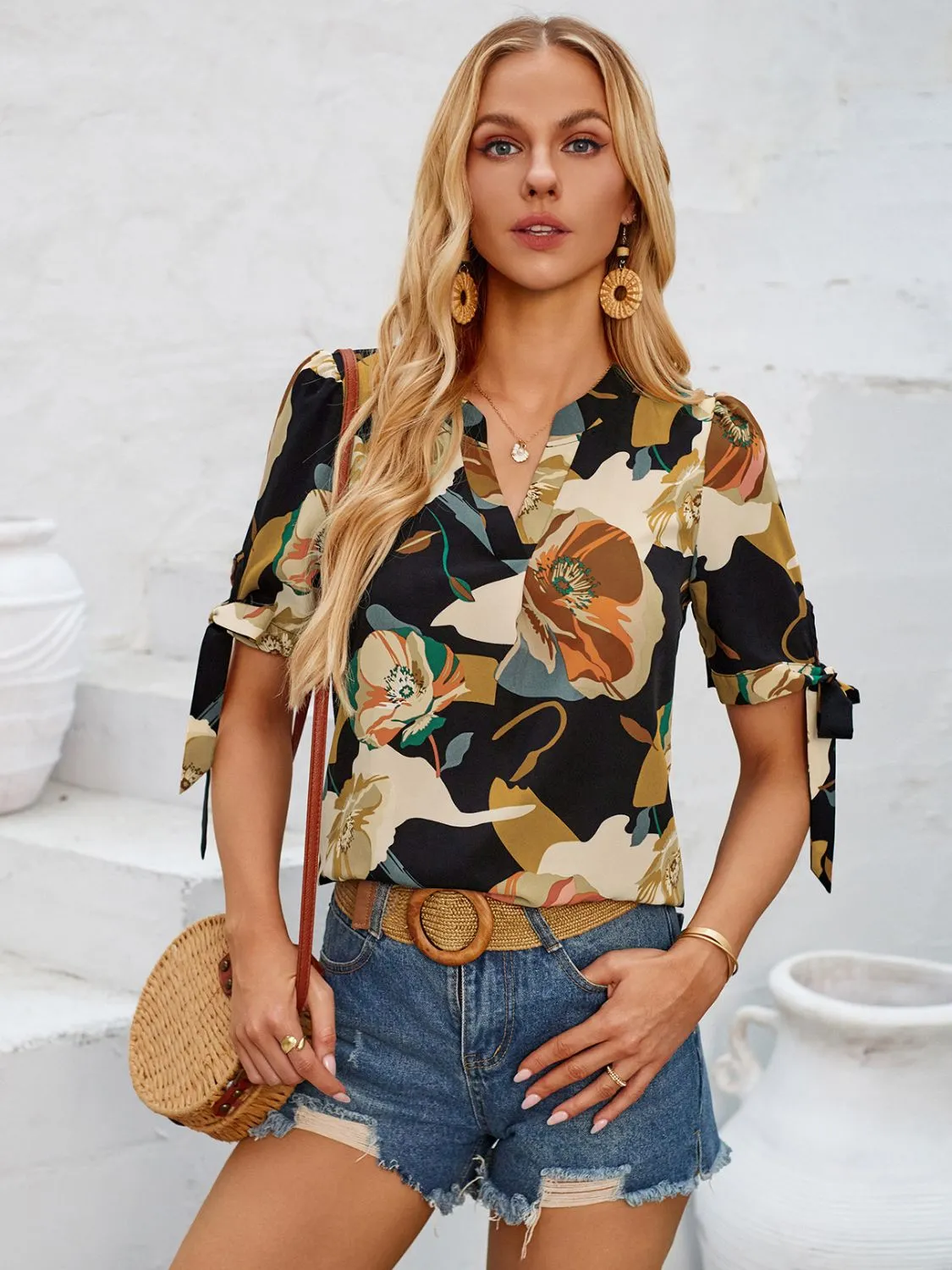 Tied Printed Notched Short Sleeve Blouse sold by Charming Charlie product image thumbnail 3