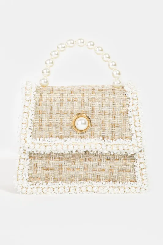 Fame Pearly Trim Woven Handbag sold by Charming Charlie