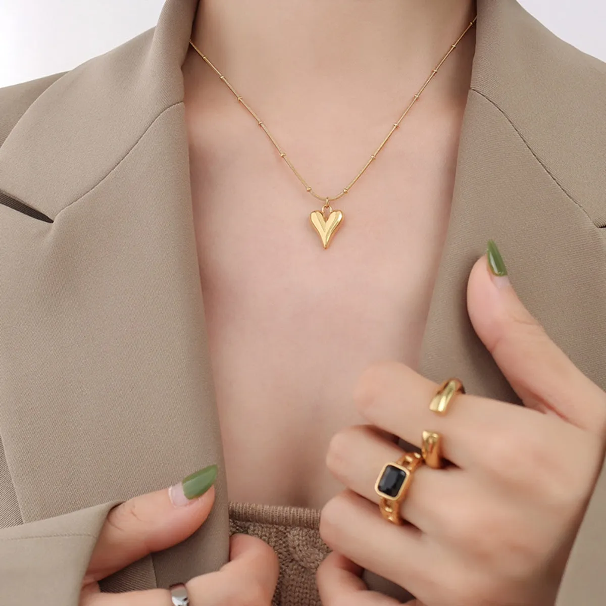 Titanium Steel Heart Pendant Necklace sold by Charming Charlie product image thumbnail 2