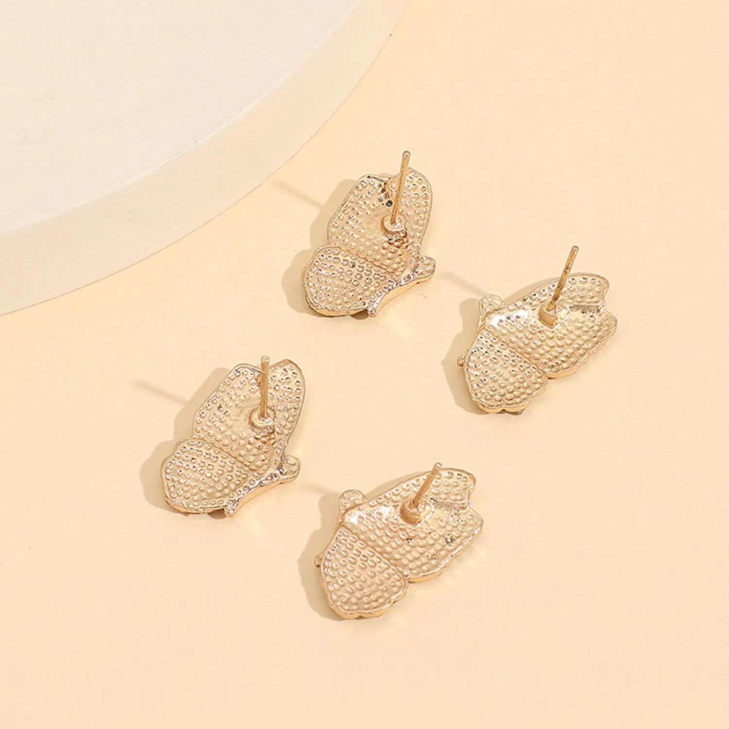 2 Piece Rhinestone Alloy Butterfly Stud Earrings sold by Charming Charlie product image thumbnail 2