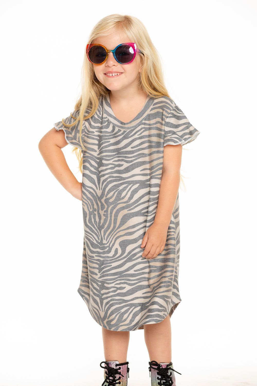 Cozy Knit Ruffle Short Sleeve Shirttail Mini Dress in Zebra Stripe sold by Chaser