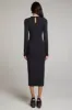 Vedaa Licorice Midi Dress sold by Chaser