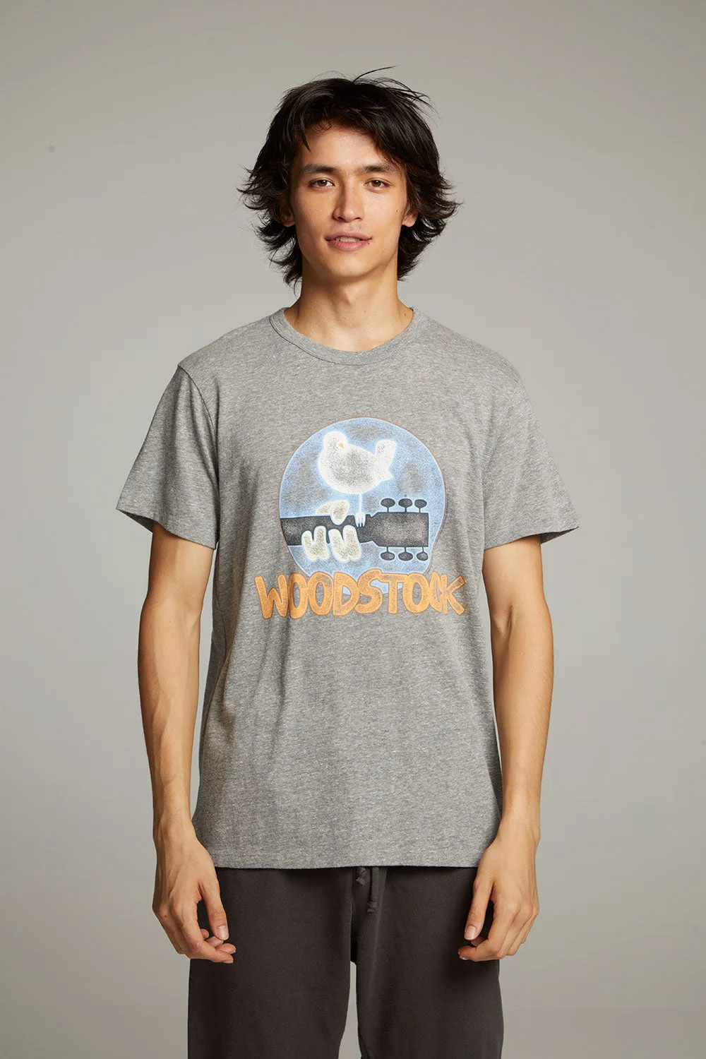 Woodstock Bird On Guitar Crew Neck Tee sold by Chaser