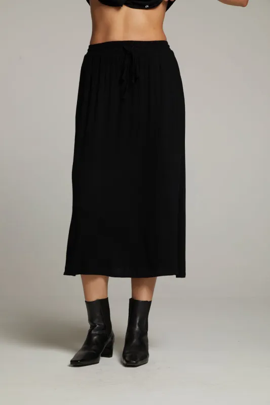 Darby Licorice Midi Skirt sold by Chaser