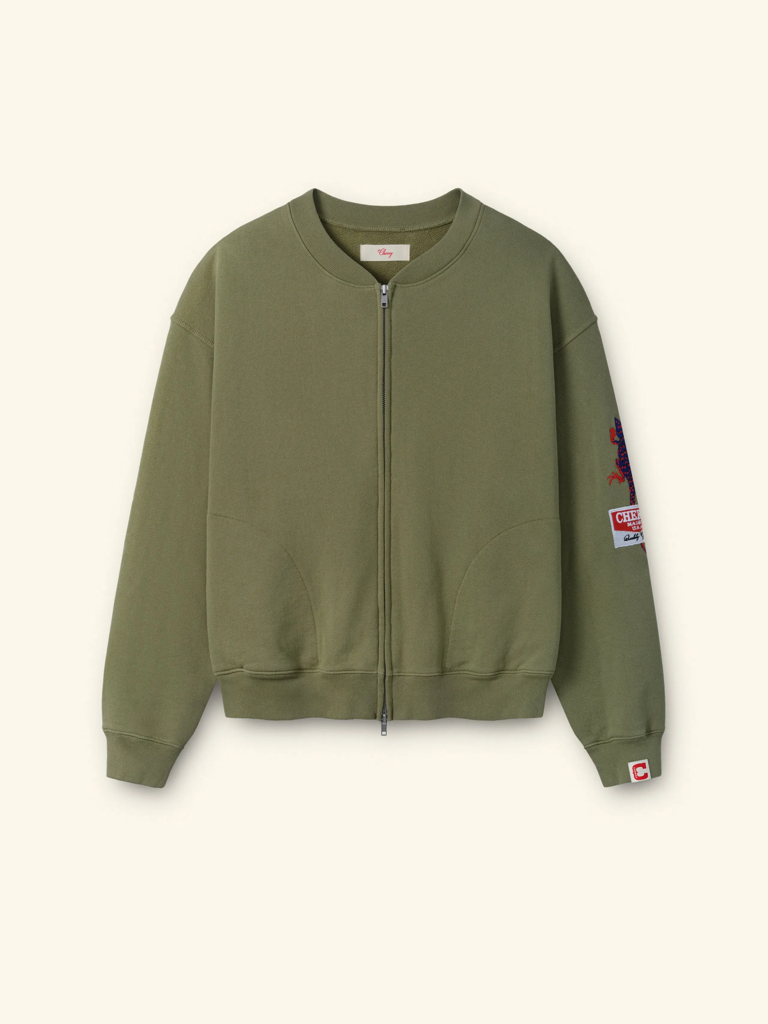 Gecko Zip Up Crew (Cactus) sold by Cherry LA