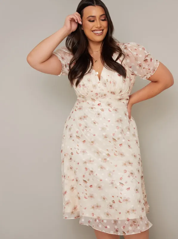 Plus Size Puff Sleeve Print Midi Dress in Cream sold by Chi Chi London