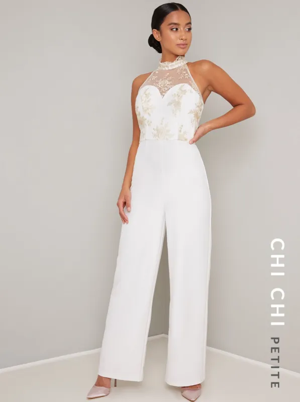 Petite High Neck Embroidered Wide Leg Jumpsuit in Cream sold by Chi Chi London