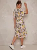 Flutter Sleeve Floral Print Midi Day Dress in White sold by Chi Chi London