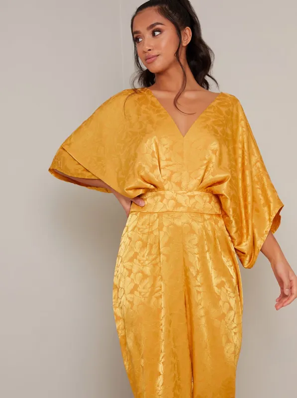 Petite Batwing Straight Leg Jumpsuit in Yellow sold by Chi Chi London