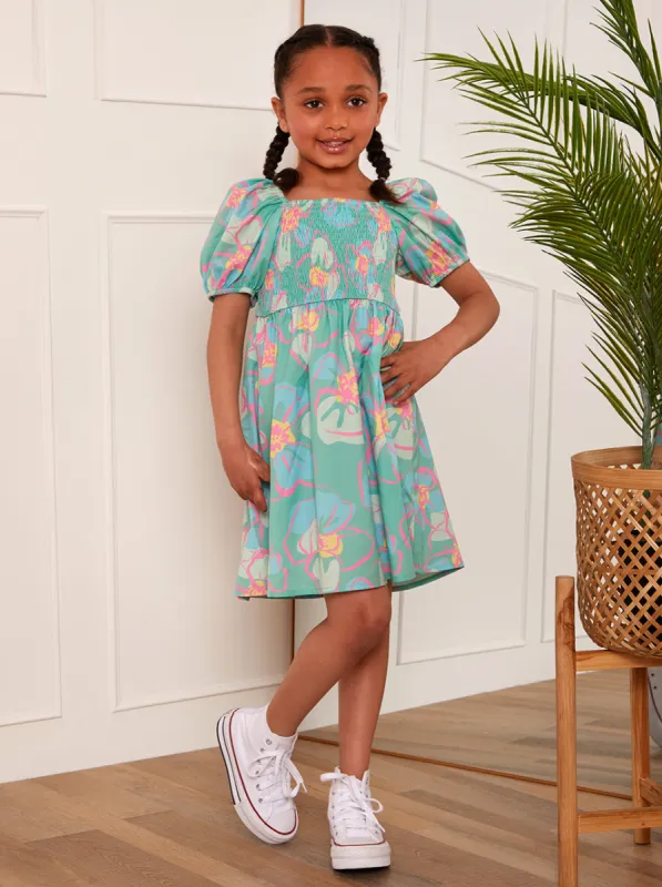 Younger Girls Puff Sleeve Shirred Floral Midi Dress in Green sold by Chi Chi London