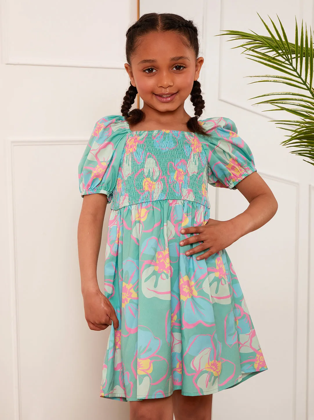 Younger Girls Puff Sleeve Shirred Floral Midi Dress in Green sold by Chi Chi London product image thumbnail 2