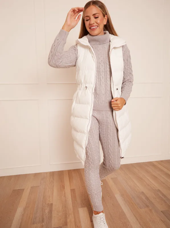 Waist Detail Padded Longline Gilet in White sold by Chi Chi London