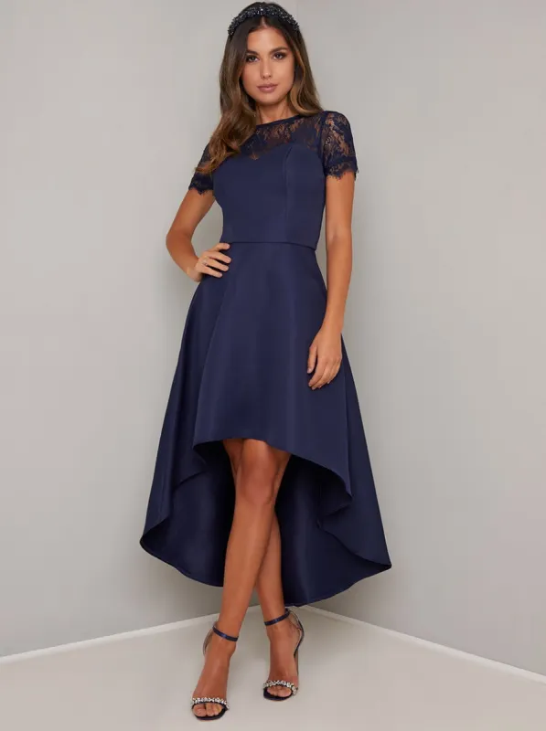 Dip Hem Lace Dress in Blue sold by Chi Chi London