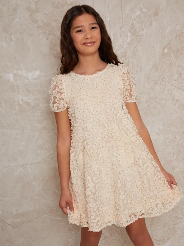 Girls Textured Metallic Polka Dot Dress in Cream sold by Chi Chi London