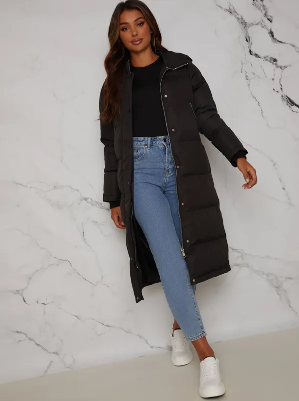Longline Oversized Padded Puffer Coat in Black sold by Chi Chi London
