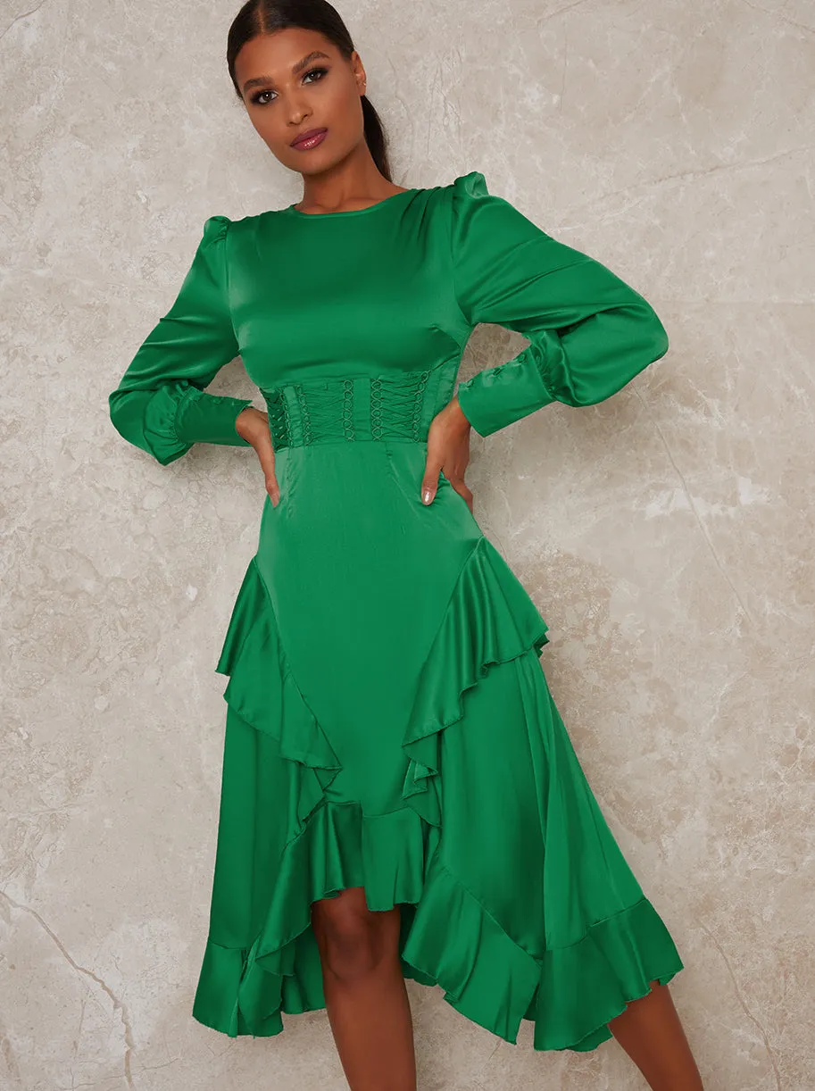 Long Sleeved Dip Hem Ruffle Dress in Green sold by Chi Chi London