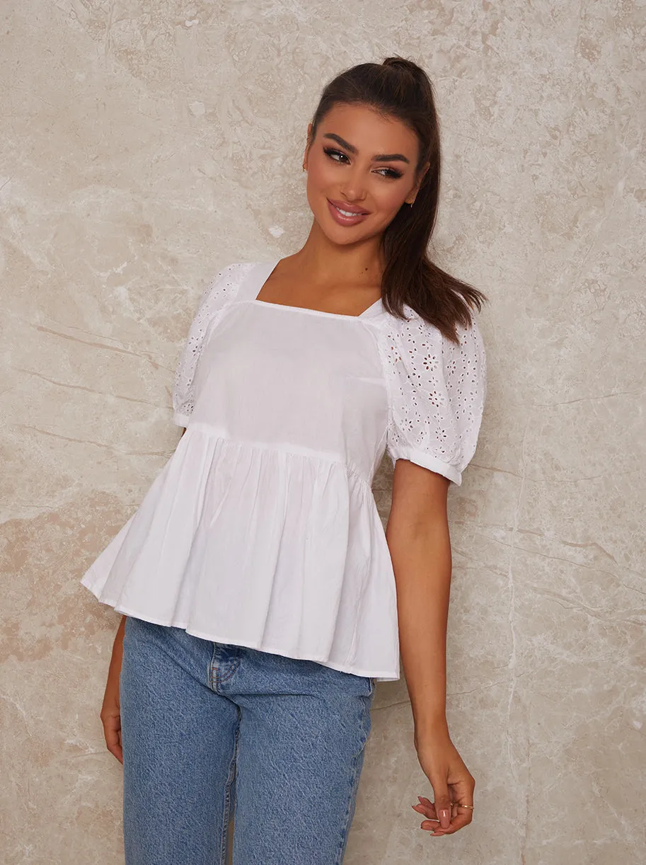 Broderie Anglais Puff Sleeve Blouse in White sold by Chi Chi London
