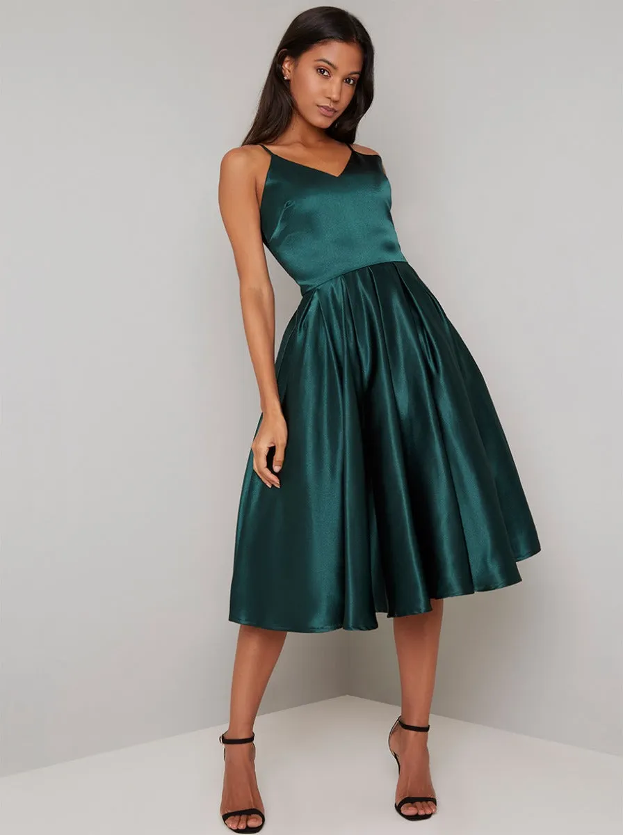 Cami Strap Silky Midi Dress in Green sold by Chi Chi London