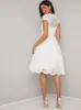 Cap Sleeved Baroque Lace Midi Dress in White sold by Chi Chi London