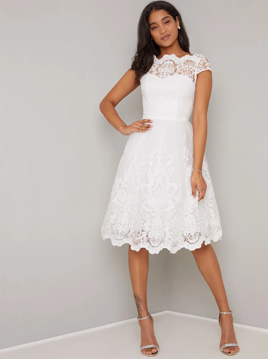 Cap Sleeved Baroque Lace Midi Dress in White sold by Chi Chi London