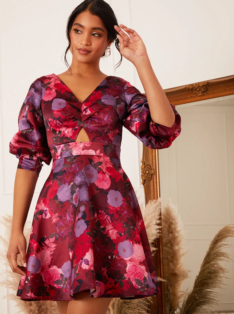 Puff Sleeve Twist Bodice Floral Mini Dress in Purple sold by Chi Chi London