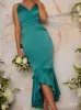 Bodycon Dress with Dip Hem Fishtail in Green sold by Chi Chi London