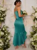 Bodycon Dress with Dip Hem Fishtail in Green sold by Chi Chi London
